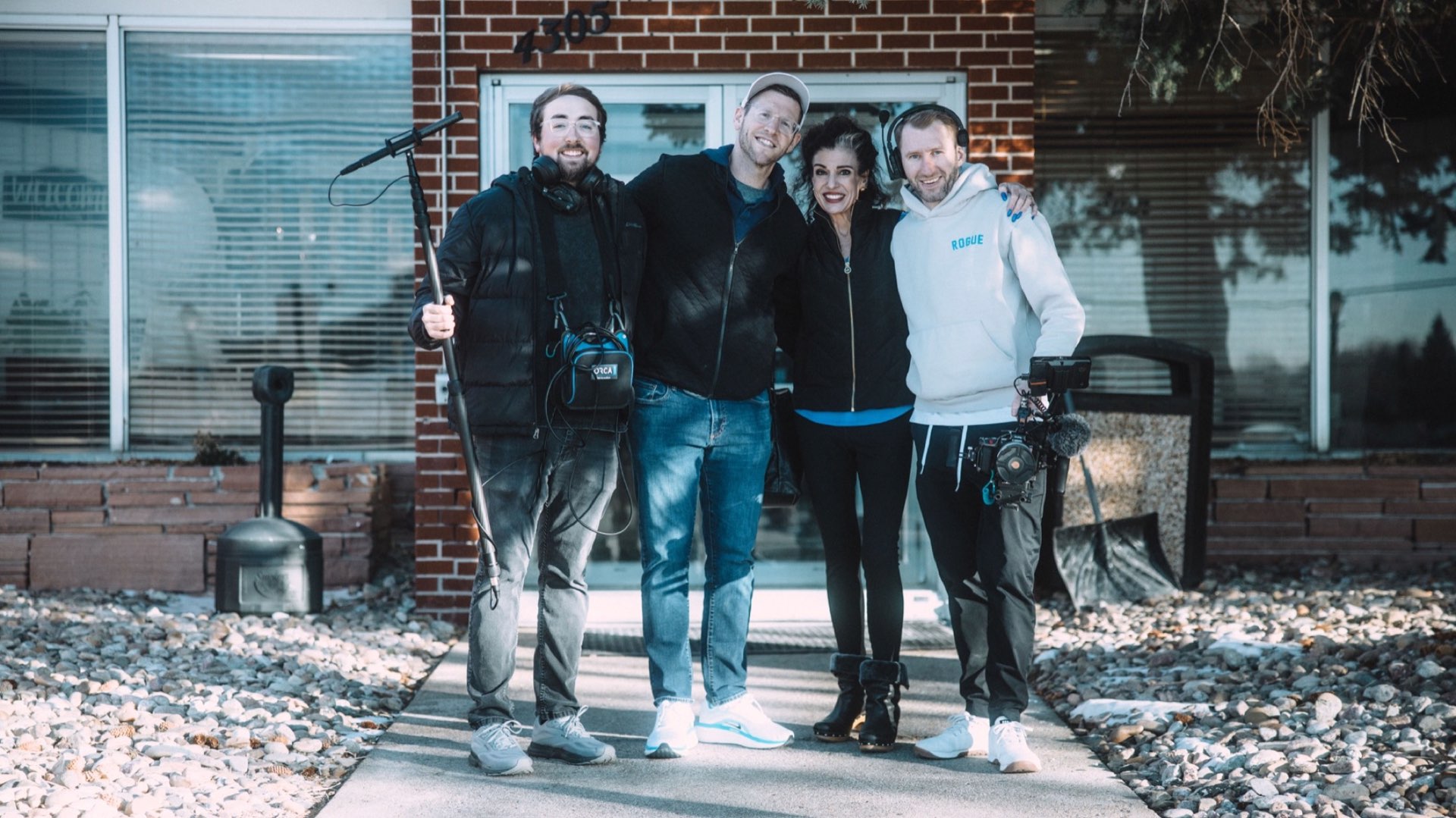 Checked In Media field team with boom operator and cinema camera operator