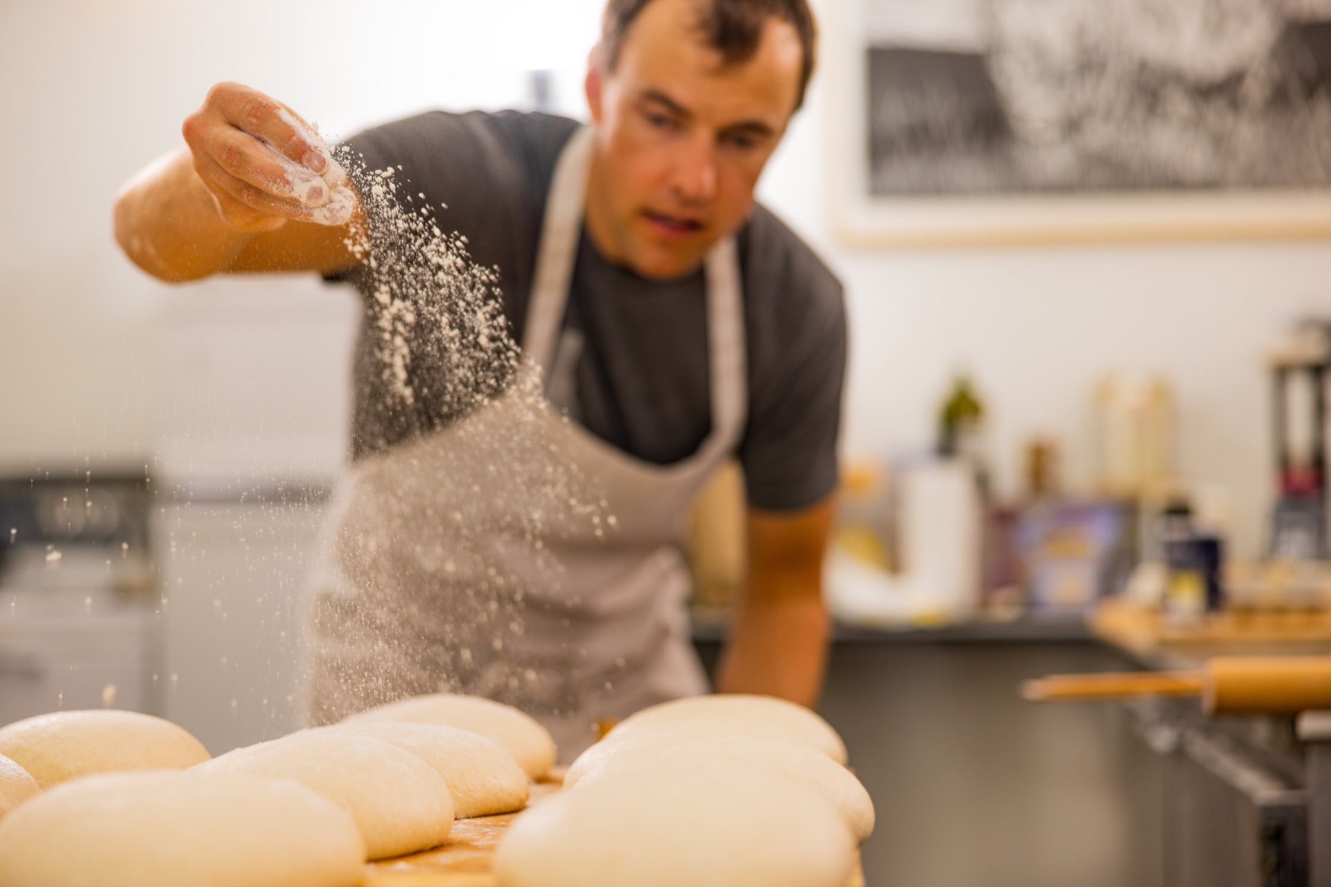 Lander bread share process image showing flour work and grain-to-pasta craft